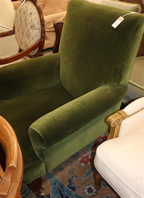 An Edwardian upholstered armchair